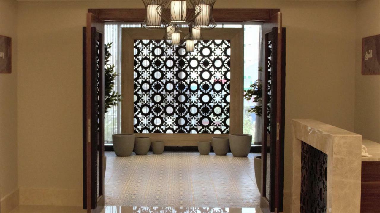 Park Inn By Radisson Makkah Aziziyah Мекка Экстерьер фото A decorative panel of glass